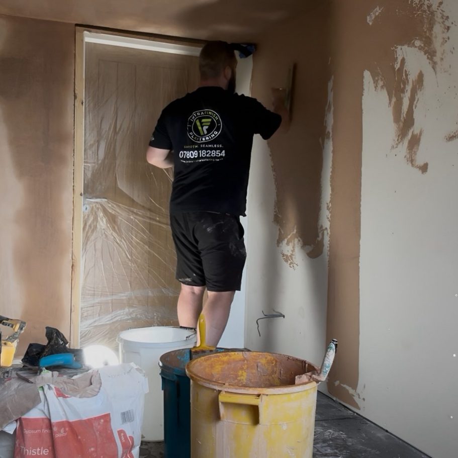 Plastering a wall in Alsager for IntraFinish Plastering.